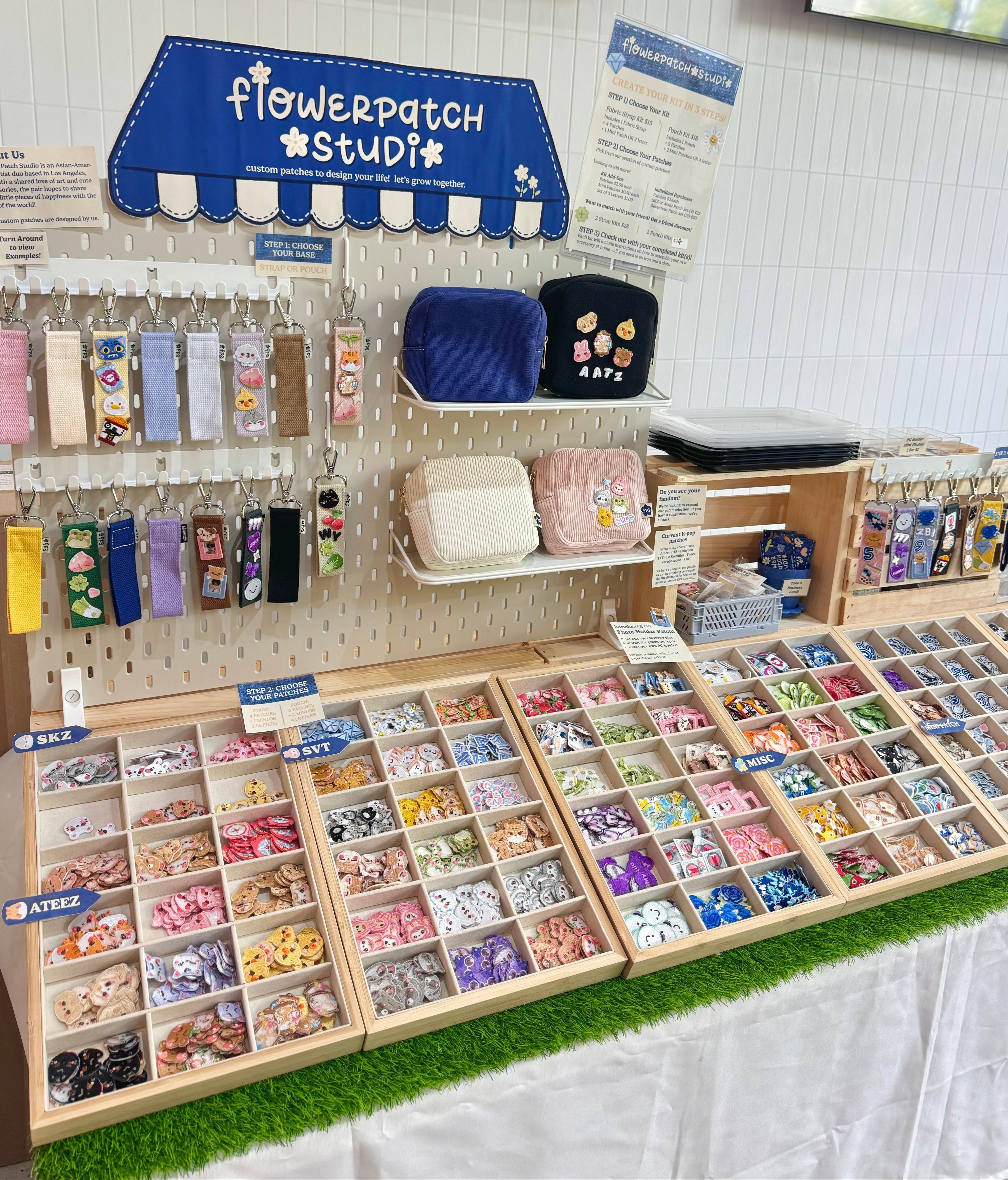 Display of stationery items with 'flowerpatch studio' branding in a store setting.